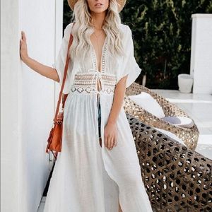 Beach Cover Ups white with lace detail and two ties in front at the waistline